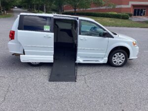 White Dodge Grand Caravan with Vantage Mobility Side Entry Manual In Floor conversion