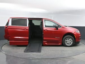 Red Chrysler Pacifica with BraunAbility Side Entry Automatic In Floor conversion