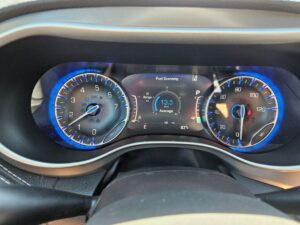 Red Chrysler Pacifica with BraunAbility Side Entry Automatic Fold Out conversion