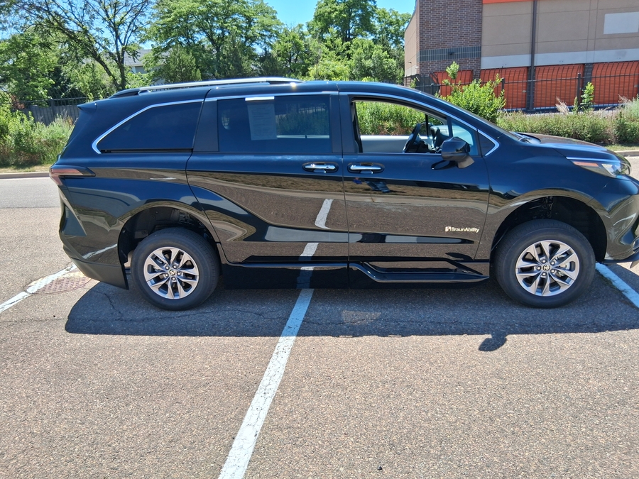 Black Toyota Sienna with BraunAbility Side Entry Automatic In Floor conversion