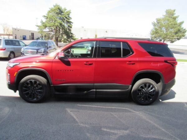 Red Chevrolet Traverse with BraunAbility Side Entry Automatic In Floor conversion