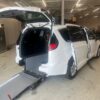White Chrysler Pacifica with Driverge Rear Entry Manual Fold Out conversion
