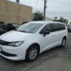 White Chrysler Voyager with Driverge Side Entry Automatic Fold Out conversion