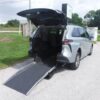 Silver Toyota Sienna with Driverge Rear Entry Manual Fold Out conversion