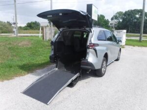 Silver Toyota Sienna with Driverge Rear Entry Manual Fold Out conversion