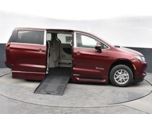Red Chrysler Voyager with BraunAbility Side Entry Automatic Fold Out conversion