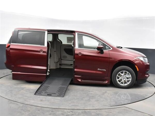 Red Chrysler Voyager with BraunAbility Side Entry Automatic Fold Out conversion