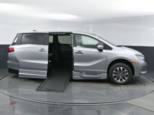 Silver Honda Odyssey with BraunAbility Side Entry Automatic In Floor conversion