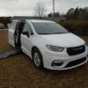 White Chrysler Pacifica with Driverge Side Entry Automatic Fold Out conversion