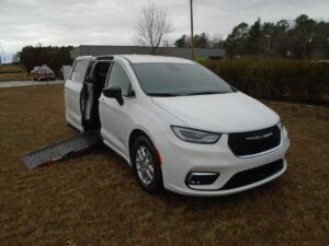 White Chrysler Pacifica with Driverge Side Entry Automatic Fold Out conversion