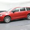 Red Chrysler Voyager with BraunAbility Rear Entry Manual Fold Out conversion