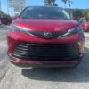 Red Toyota Sienna with BraunAbility Side Entry Automatic Fold Out conversion