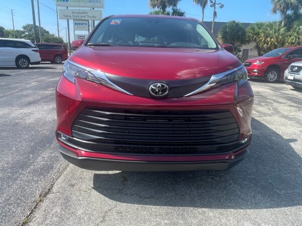 Red Toyota Sienna with BraunAbility Side Entry Automatic Fold Out conversion