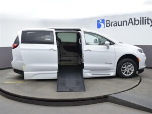 White Chrysler Pacifica with BraunAbility Side Entry Automatic Fold Out conversion