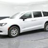 White Chrysler Voyager with BraunAbility Rear Entry Manual Fold Out conversion