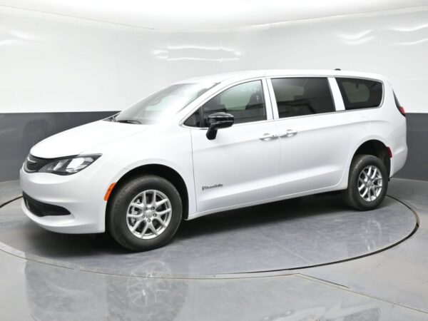 White Chrysler Voyager with BraunAbility Rear Entry Manual Fold Out conversion