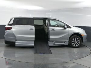 Silver Honda Odyssey with BraunAbility Side Entry Automatic In Floor conversion