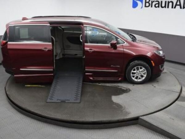 Red Chrysler Pacifica with BraunAbility Side Entry Automatic In Floor conversion