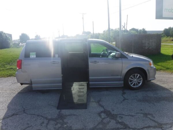 Silver Dodge Grand Caravan with BraunAbility Side Entry Automatic Fold Out conversion