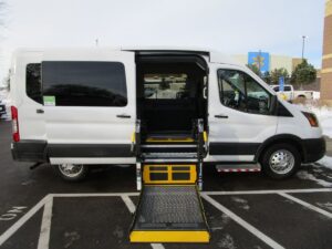 White Ford T350 with Driverge Side Entry Automatic Fold Out conversion