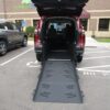 Red Toyota Sienna with Vantage Mobility Rear Entry Manual Fold Out conversion