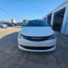 White Chrysler Voyager with Driverge Side Entry Automatic Fold Out conversion