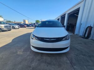 White Chrysler Voyager with Driverge Side Entry Automatic Fold Out conversion