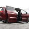 Red Chrysler Voyager with BraunAbility Side Entry Automatic Fold Out conversion