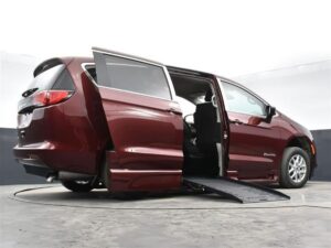 Red Chrysler Voyager with BraunAbility Side Entry Automatic Fold Out conversion