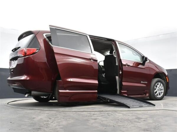 Red Chrysler Voyager with BraunAbility Side Entry Automatic Fold Out conversion