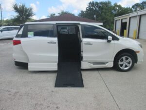 White Honda Odyssey with BraunAbility Side Entry Automatic In Floor conversion