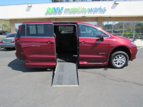 Red Chrysler Pacifica with Driverge Side Entry Automatic Fold Out conversion