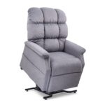 The Cambridge Lift Chair is a light gray upholstered recliner with padded cushions and armrests, shown in a partially elevated position.
