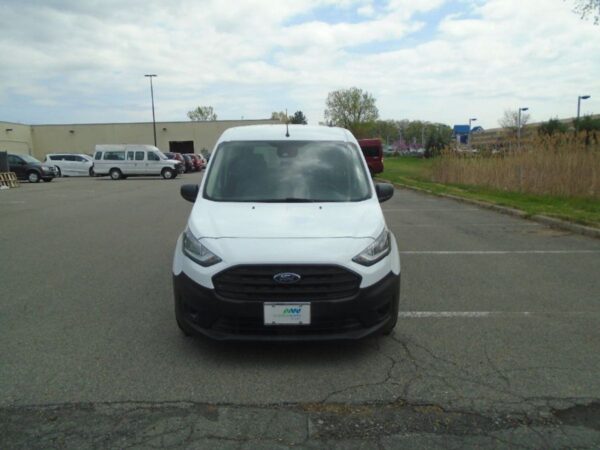 White Ford Transit Connect with Driverge Rear Entry Manual Fold Out conversion