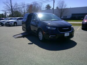 Black Chrysler Pacifica with Driverge Side Entry Automatic Fold Out conversion