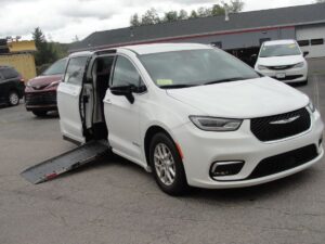 White Chrysler Pacifica with Driverge Side Entry Automatic Fold Out conversion