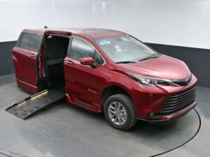 Red Toyota Sienna with BraunAbility Side Entry Automatic Fold Out conversion