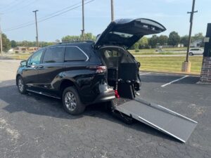 Black Toyota Sienna with Driverge Rear Entry Manual Fold Out conversion