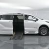 White Toyota Sienna with BraunAbility Side Entry Automatic Fold Out conversion