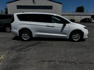 White Chrysler Pacifica with Driverge Rear Entry Manual Fold Out conversion