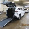 White Toyota Sienna with Driverge Rear Entry Manual Fold Out conversion