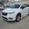 White Chrysler Pacifica with BraunAbility Side Entry Automatic Fold Out conversion