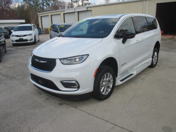 White Chrysler Pacifica with BraunAbility Side Entry Automatic Fold Out conversion