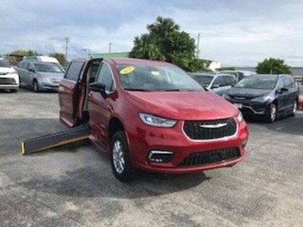 Red Chrysler Pacifica with Driverge Side Entry Automatic Fold Out conversion