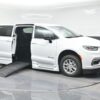 White Chrysler Pacifica with BraunAbility Side Entry Automatic Fold Out conversion