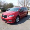 Red Chrysler Pacifica with Driverge Side Entry Automatic Fold Out conversion