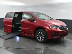 Red Honda Odyssey with BraunAbility Side Entry Automatic In Floor conversion