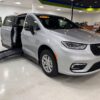 Silver Chrysler Pacifica with BraunAbility Side Entry Manual Fold Out conversion