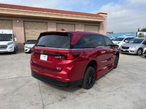 Red Honda Odyssey with Vantage Mobility Side Entry Automatic In Floor conversion