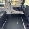White Chrysler Pacifica with Driverge Side Entry Automatic Fold Out conversion